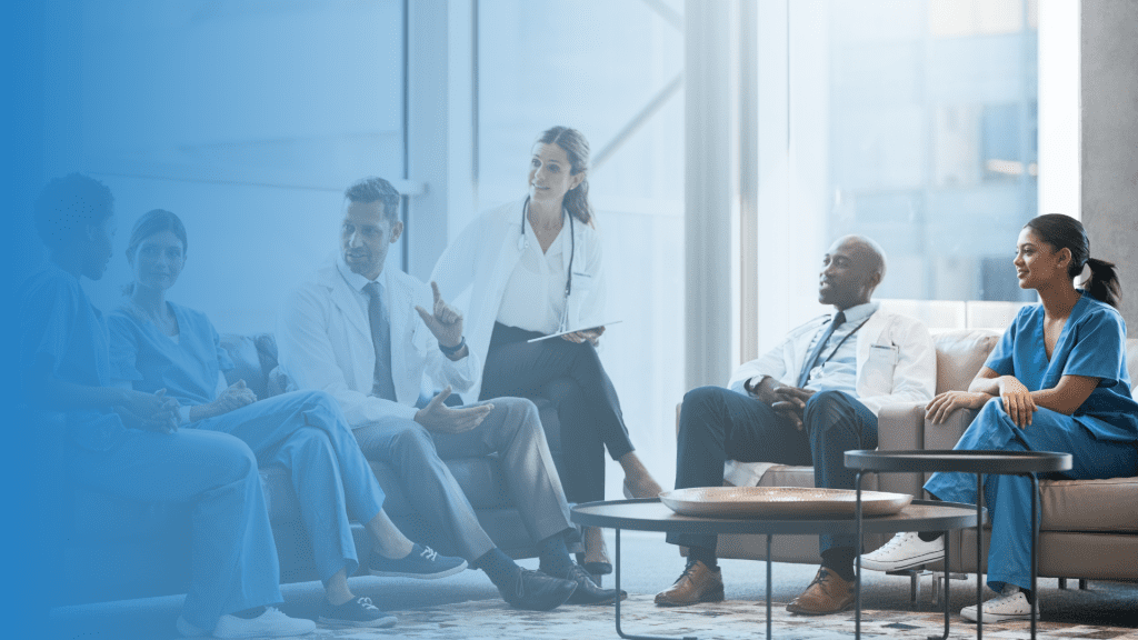 Healthcare IT recruiters meeting with hospital technology leaders and IT candidates in a collaborative environment